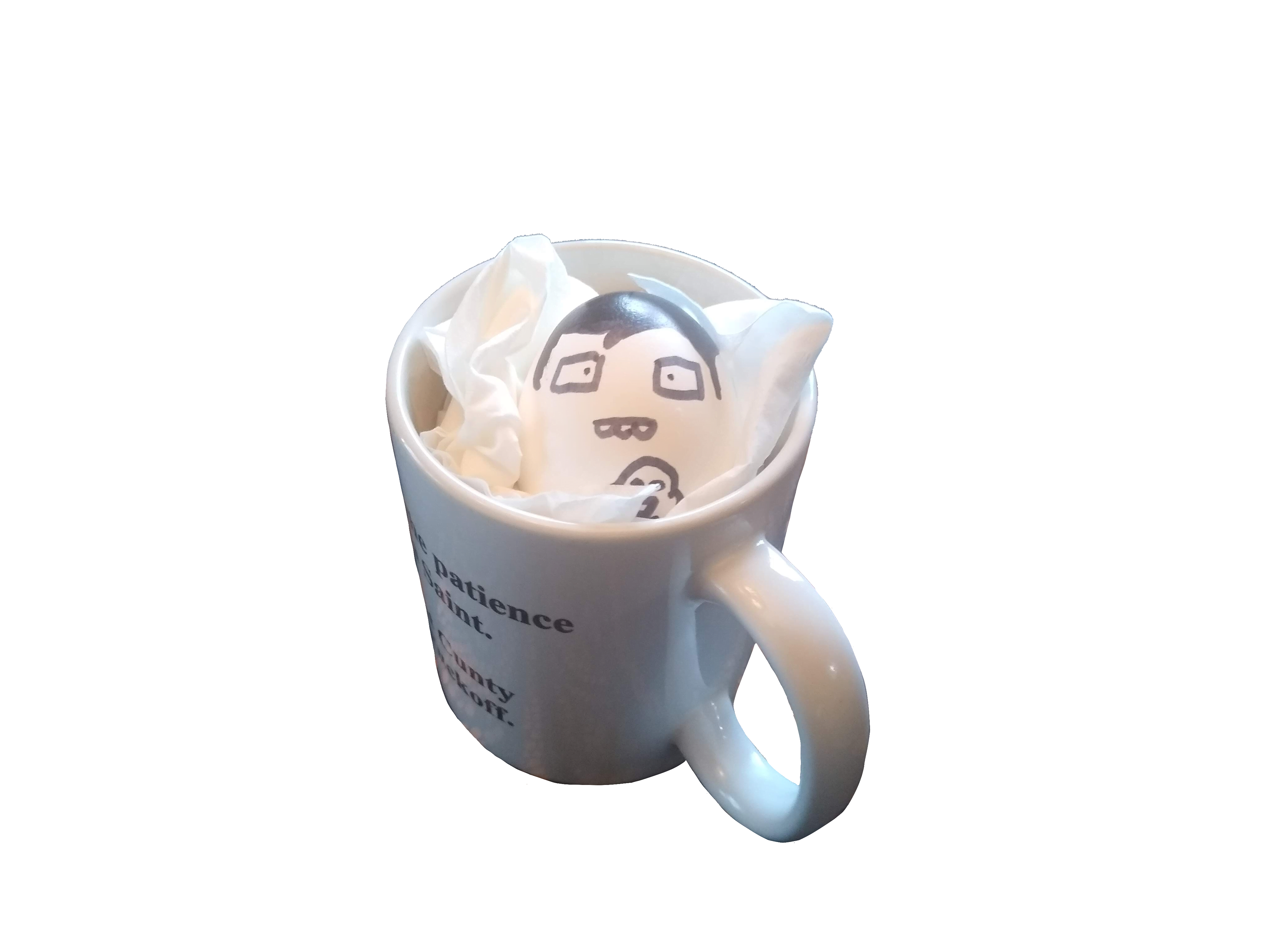 An egg in a cup surrounded by tissue. Drawn on it is the face of John Egbert from Homestuck.