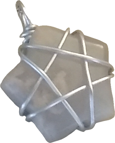 a quartz rock wrapped in silver to look like a star