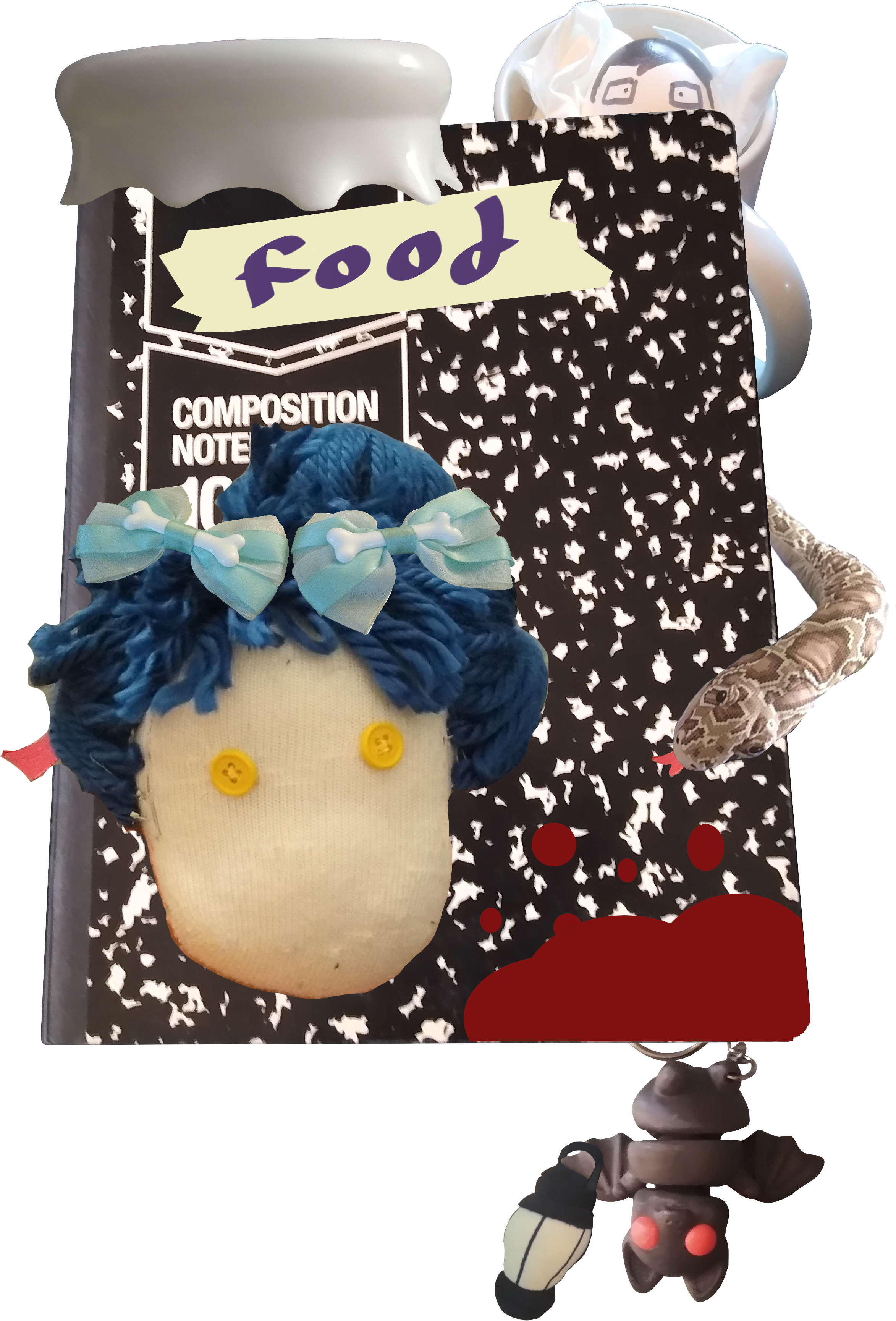 Notebook labelled 'food' with random objects attached.