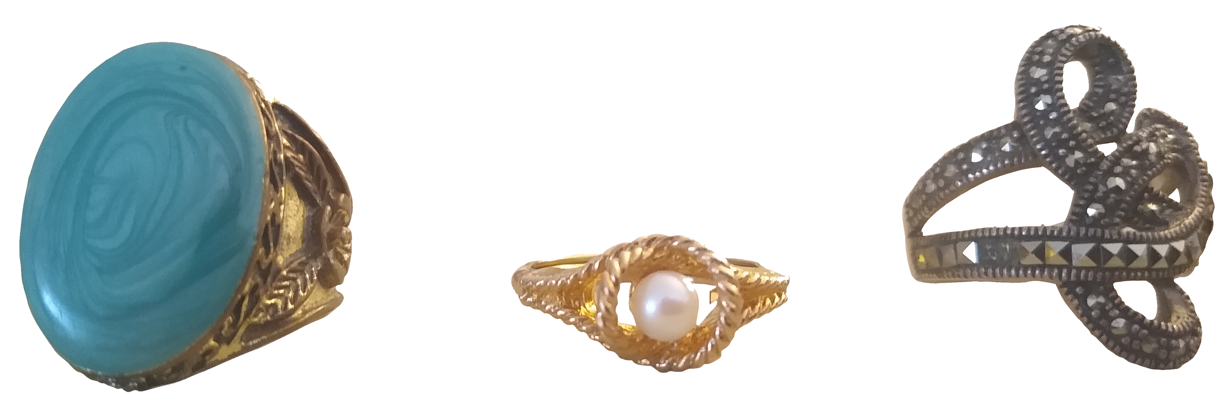 Three rings. A large turquiose gem, a pearl, and a knot ring.